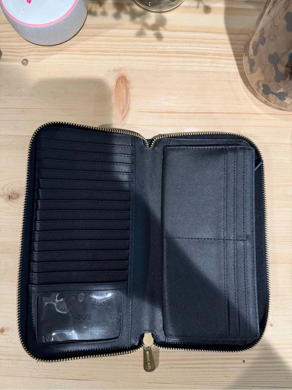 Michael Kors Black Pebbled Leather Zip Wallet with Gold Plate